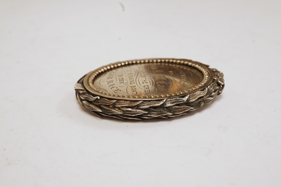 A Victorian oval medal, with foliate border and engraved inscription relating to the 'City of Derry Regatta, 28th August, 1868', 54mm. Condition - fair to good